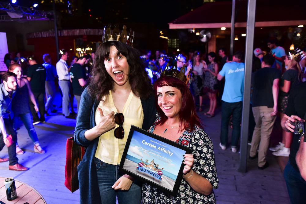 Certain Affinity employees accepting an Austinfest's coolest companies in Austin award