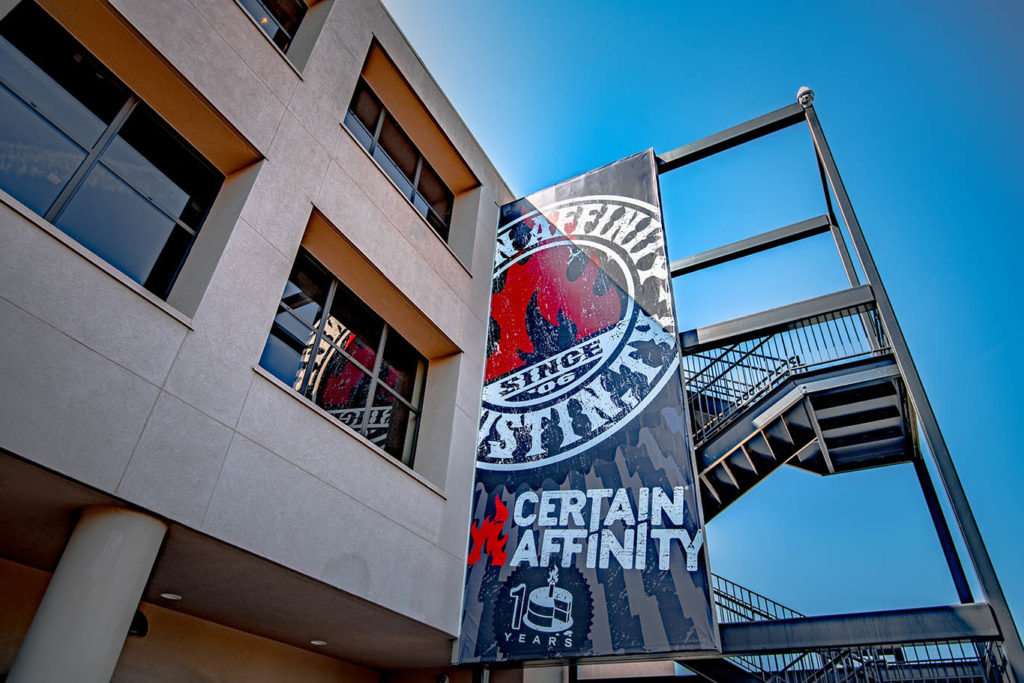 Certain Affinity's 10 year anniversary banner outside the Austin office building