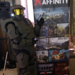 Master Chief showing off the Certain Affinity studio banner detailing our previous work